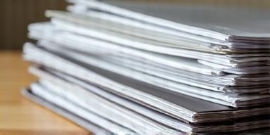 Selection of professionally bound and laminated reports